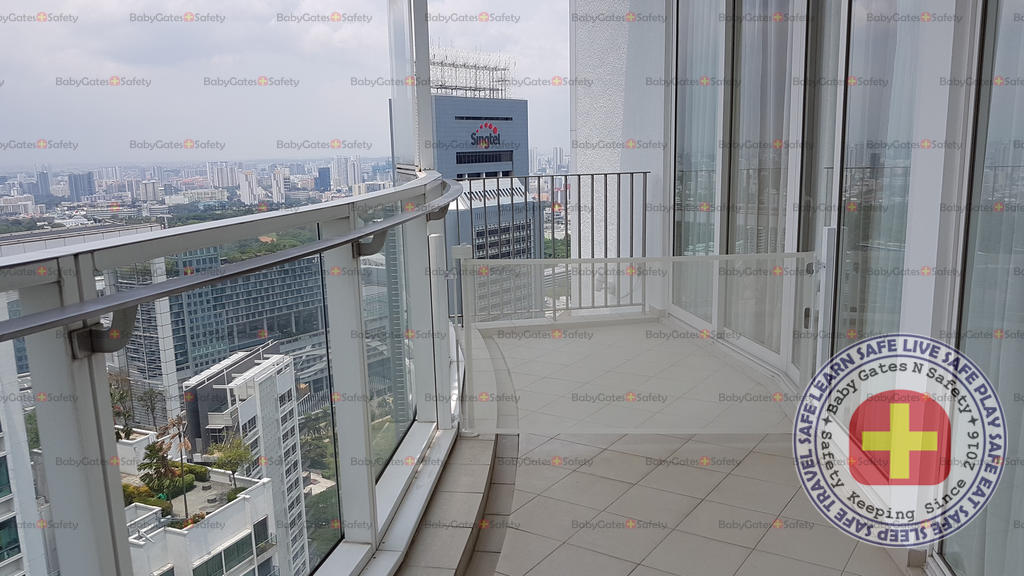 Retract-A-Gate Retractable Gate 72" used at Penthouse balcony prevents child to reach railings