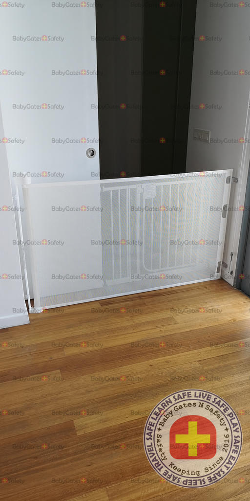 Smart Retract Gate used in front of a sliding door